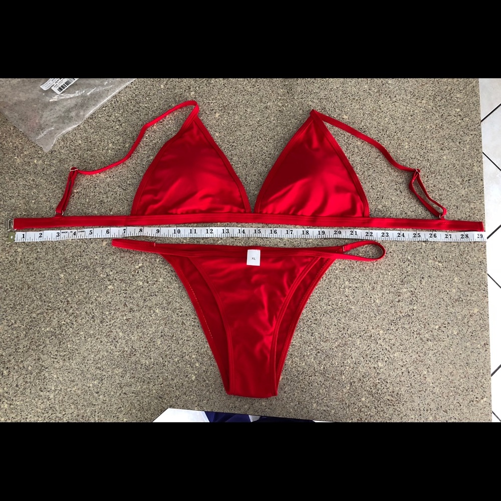 Red cheeky bikini fits like a L